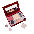 Collector's Kit – rote Samt-Palette mit Spiegel, Make-up-Produkten und Applikatoren auf weißem Hintergrund – Make-up