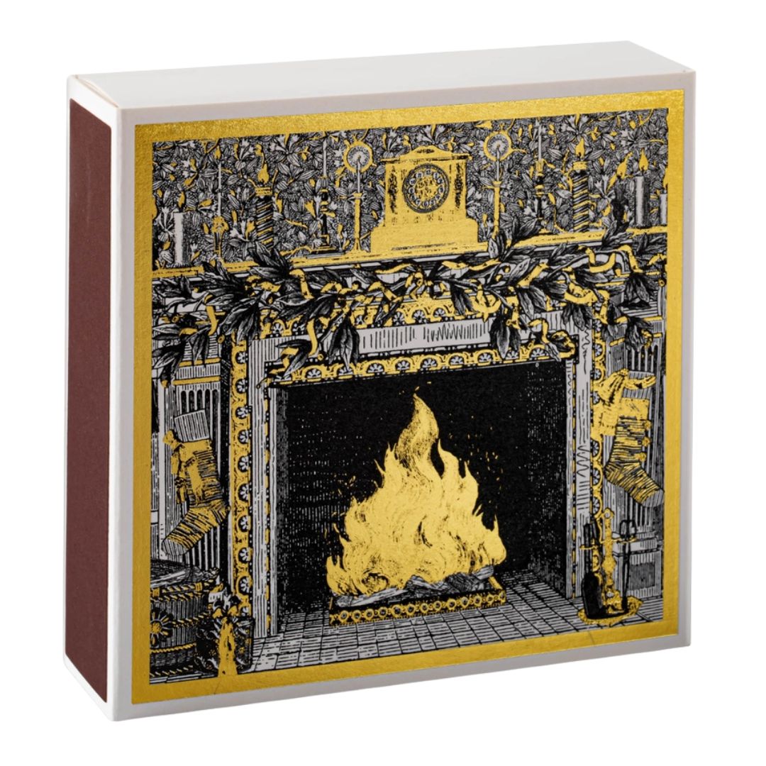 Fireside gift box – white cardboard with gold-black fireplace design, white background – scented candle