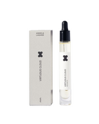 Virtuous Cloud Perfume Oil – clear glass bottle with black dropper cap, white label and grey box – perfume