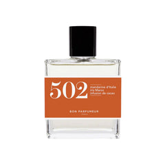 502 Iris Cartagena Eau de Parfum – clear glass bottle with black cap, orange label, white background – perfume