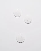 Bha Exfoliator – three clear drops on white background, skin care