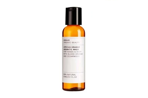 Evolve Organic Beauty African Orange Aromatic Wash, orange 50ml bottle with black cap, skin care