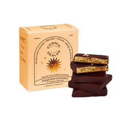 Cosmic Dealer Toasted Coconut & Turmeric Chocolate – box of 4, cream-colored packaging, white background – health snack