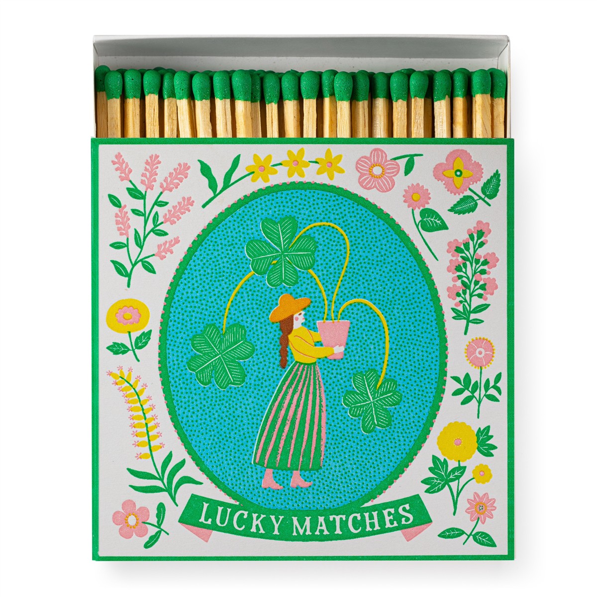 Lucky Matches – bunte Streichholzschachtel mit Kleeblatt-Motiv, grünen Köpfen, weißem Hintergrund – Dekoartikel