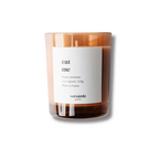 Versatile Paris Eat Me scented candle in a brown glass jar, 135g, on a white background, home fragrance.