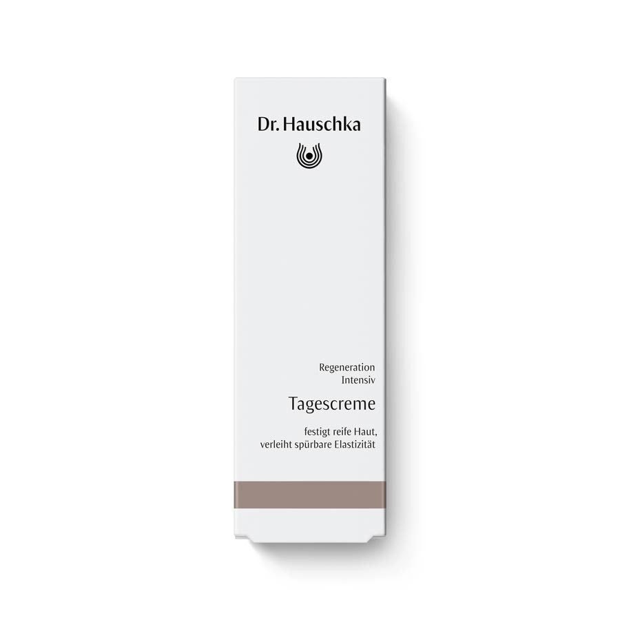 Dr. Hauschka Regenerating Day Cream Intensive – weiße Kartonverpackung mit braunem Streifen, weißer Hintergrund – Hautpflege