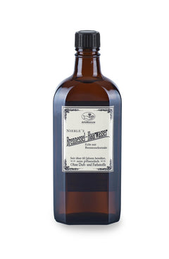 Nierle’s Nettle Hair Water – brown glass bottle with black screw cap, white label on white background – hair care