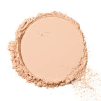 Loose Powder 00 Translucent – loose powder in soft beige, white background – makeup