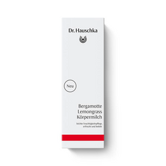Dr. Hauschka Bergamotte Lemongrass Body Milk – white cardboard packaging with red stripe, white background – body care