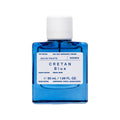 Eau de Toilette in a blue Bottle, white Background