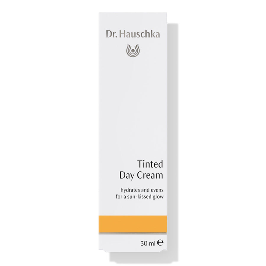 Dr. Hauschka Tinted Day Cream – white tube 30 ml, orange stripe, white background – face care