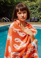 Lobster Organic Cotton Washcloth – orange cotton washcloth with lobster print, blue trim, pool background – skin care