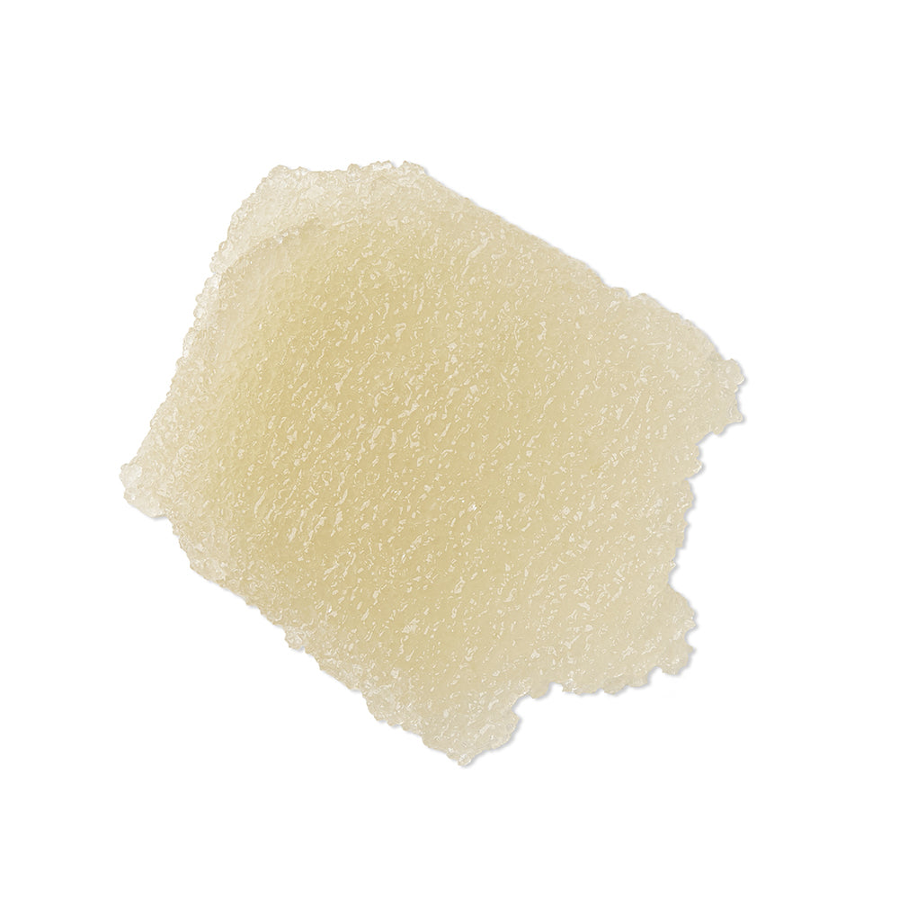 Textur des Tropical Blossom Body Polish, hellbeiges Körperpeeling auf weißem Hintergrund, Hautpflege