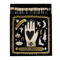 Black Miracle Luxury – black matchbox with gold-white design, white background – decor