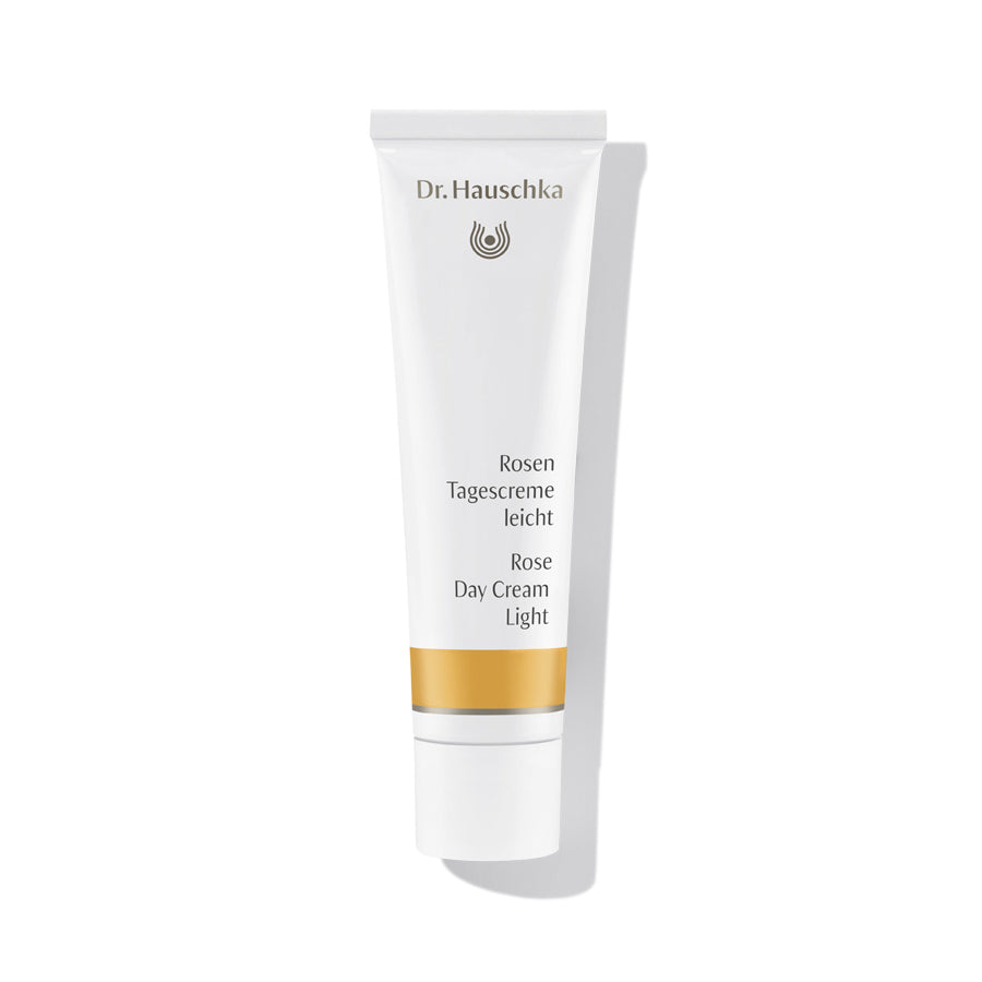 Dr. Hauschka Rose Day Cream Light – white tube with gold stripe, white cap, white background – skin care