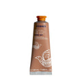 KORRES Mandel-Handcreme – braune Tube 50ml, orangener Deckel, weißer Hintergrund – Handpflege