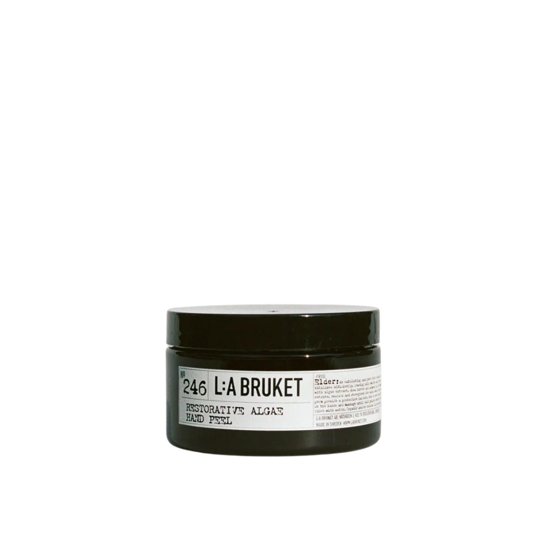 L:A BRUKET No. 246 Restorative Algae Hand Peel – black glass jar 100ml, black lid on white background – hand care
