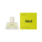 Abel Pink Iris Eau de Parfum – 50ml glass bottle with white cap, yellow box, white background – perfume