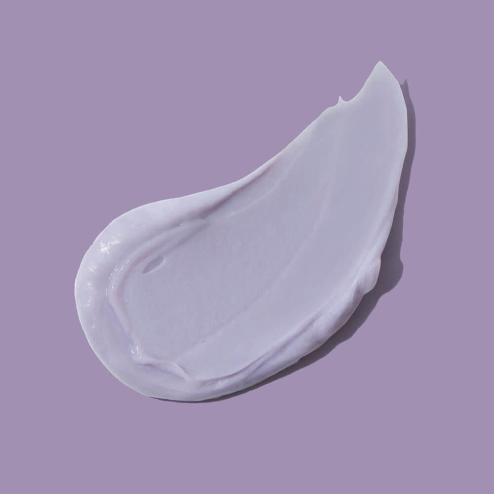 Bright Balance Conditioner – creamy texture on purple background – hair care