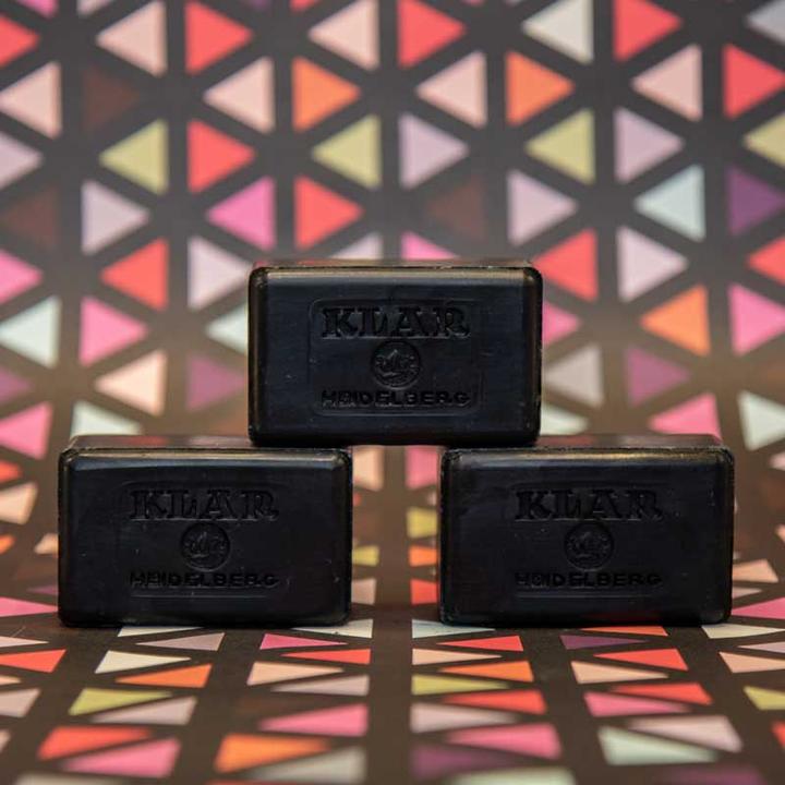 KLAR Heidelberg Activated Charcoal Soap – black soap bars, geometric background – skin care