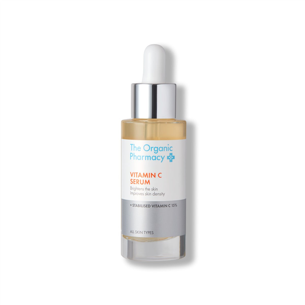 The Organic Pharmacy Vitamin C Serum in einer Glasflasche mit Pipette auf weißem Hintergrund, Hautpflege.