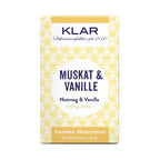 KLAR Solid Shampoo Nutmeg & Vanilla – 100g, yellow-white packaging with floral pattern, white background – hair care