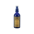 Kölnisch Wasser Anno 1856 – blue glass bottle with spray nozzle, gold label, white background – perfume