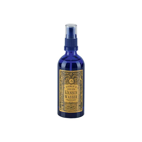 Kölnisch Wasser Anno 1856 – blue glass bottle with spray nozzle, gold label, white background – perfume