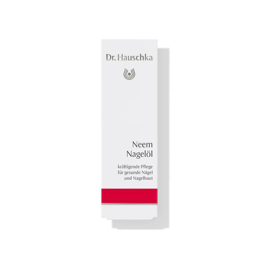 Dr. Hauschka Neem Nail Oil – white cardboard packaging with red stripe, white background – nail care