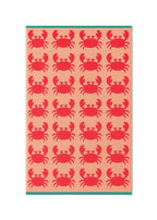 Crabs Organic Cotton Beach Towel with red crabs on peach background, teal border – beach accessory