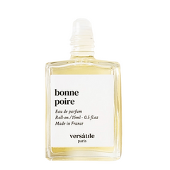 Bonne Poire Roll-on perfume oil in a clear 15ml glass bottle with a white cap on a white background. Fragrance oil.