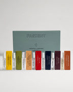 Fascent Discovery Set 7 x 1,2 ml – farbige Sprayfläschchen vor mintfarbenem Karton – Parfümprobe