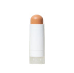 A white stick with skin-toned concealer or foundation on a white background.