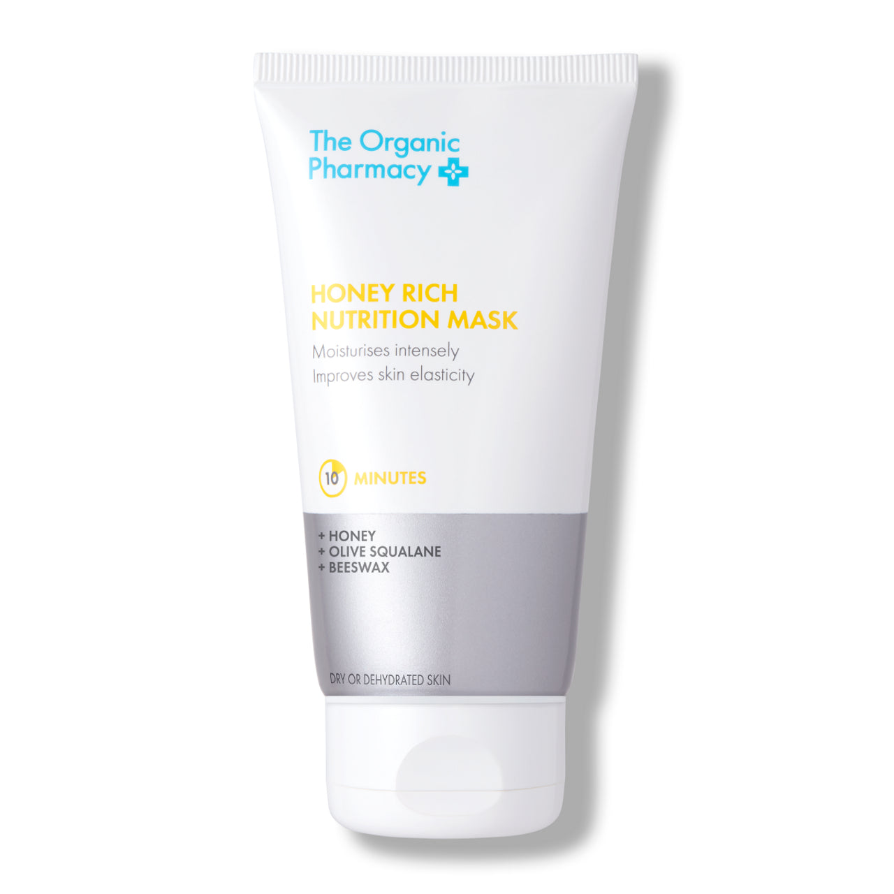 The Organic Pharmacy Honey Rich Nutrition Mask in einer Tube mit weißem Schraubverschluss auf weißem Grund, Hautpflege