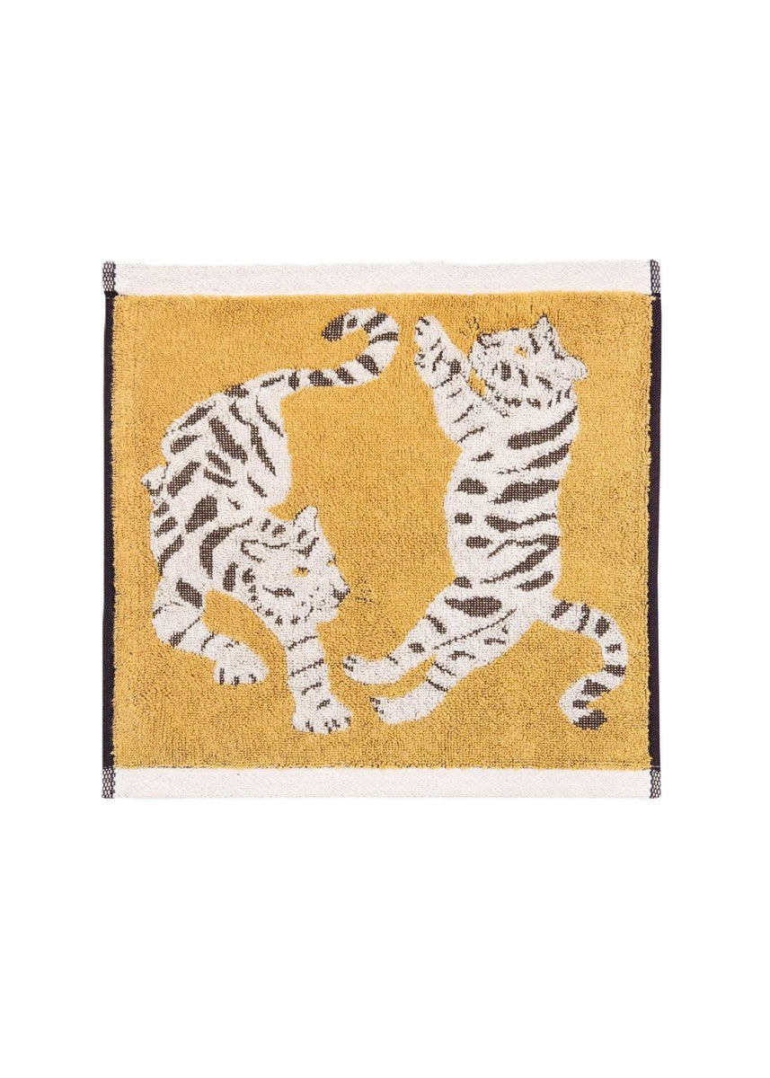 Tigers Organic Cotton Waschlappen – gelber Baumwollwaschlappen mit Tiger-Motiv, weißer Rand, weißem Hintergrund – Gesichtspflege