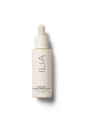 ILIA True Skin Radiant Priming Serum in a beige glass bottle with a dropper on a white background, skin care.