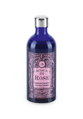 Aqua di Rose – dark blue glass bottle with silver cap, pink label on white background – skin cleansing