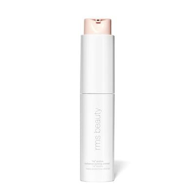 rms beauty Re" Evolve Radiance Locking Primer in a white bottle with pump dispenser on white background, makeup primer