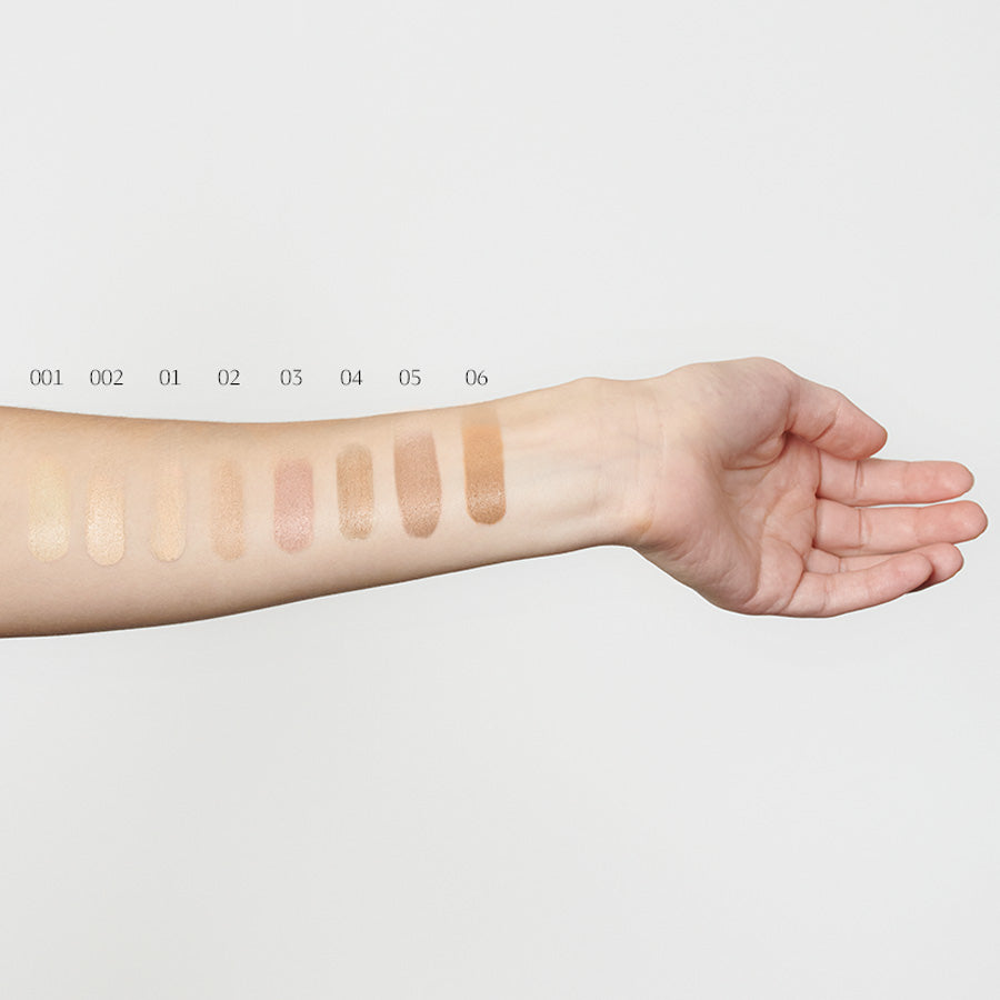 Foundation 04 Hazelnut – swatch on forearm, neutral background – makeup