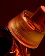 Abel Coat Check Eau de Parfum – golden spray bottle 50ml, pink cap, dark background – perfume