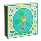 Lucky Matches – quadratische Schachtel mit floraler Illustration, grüner Umrandung, weißem Hintergrund – Deko