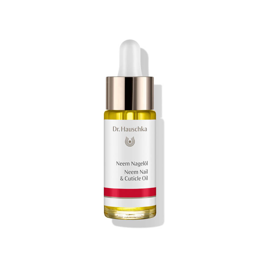 Dr. Hauschka Neem Nail Oil – glass bottle with dropper, white-red label, gold ring, white background – nail care