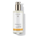 Dr. Hauschka Soothing Cleansing Milk – clear bottle with pump dispenser, white-orange label, white background – skin care