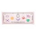 Cosmic Alchemy Dealer High-Vibes Herbal Chocolate – rosa Verpackung 140g, magische Symbole, weißer Hintergrund – Genuss