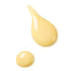 Activating Day Fluid – creamy texture, pale yellow drops on white background – skin care