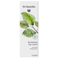 Dr. Hauschka Aktivierendes Tagesfluid – 75ml, weißes Karton-Verpackung mit grünen Blättern, Value Size – Hautpflege