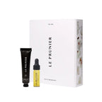 Le Prunier Petite Prunier Kit – black tube and yellow glass bottle with dropper, white box – skin care