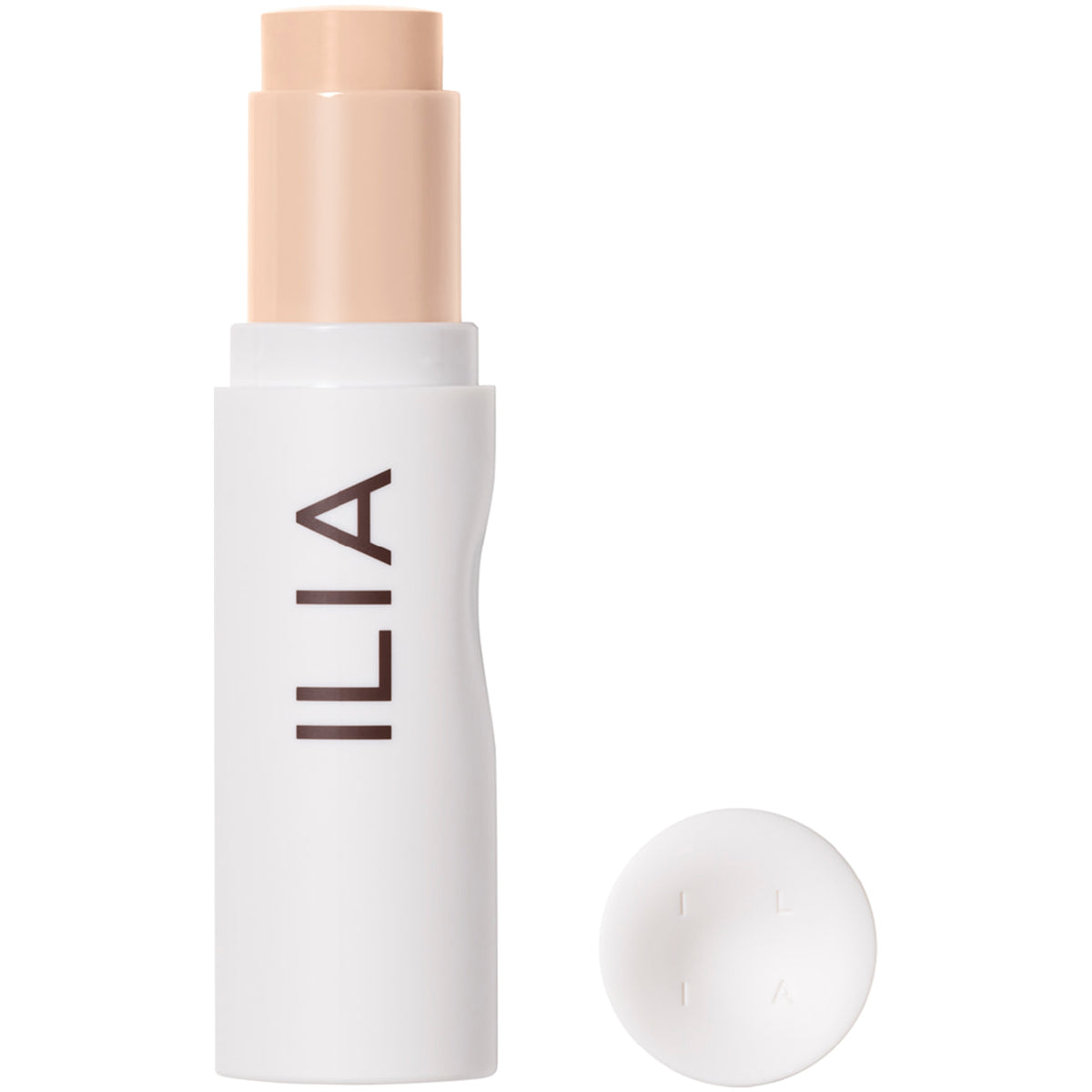 ILIA Foundation Stick in hellem Beigeton mit weißem Gehäuse und abgenommenem Deckel.