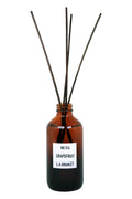 L:A BRUKET No. 314 Grapefruit Room Diffuser – amber glass bottle with reeds, white label, white background – fragrance