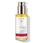 Dr. Hauschka Blackthorn Toning Body Oil – clear glass bottle with pump dispenser, white-red label, white background – body care
